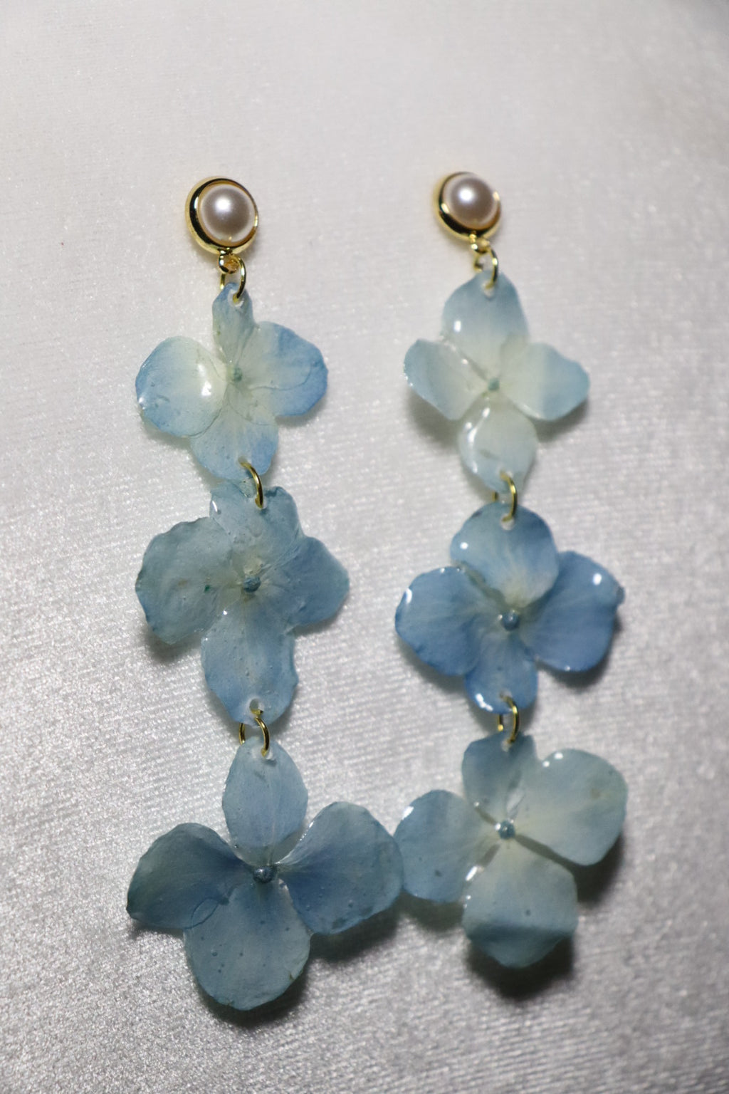 Baby blue earrings🪽